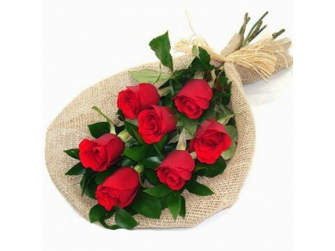 Букети для жінок 7 червоних троянд